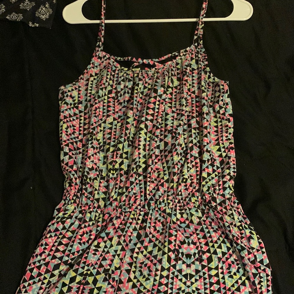 Shorts Romper/ jumper with open back and spaghetti straps.